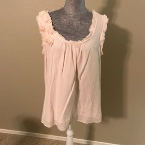 Cute babydoll like light peach shirt.
